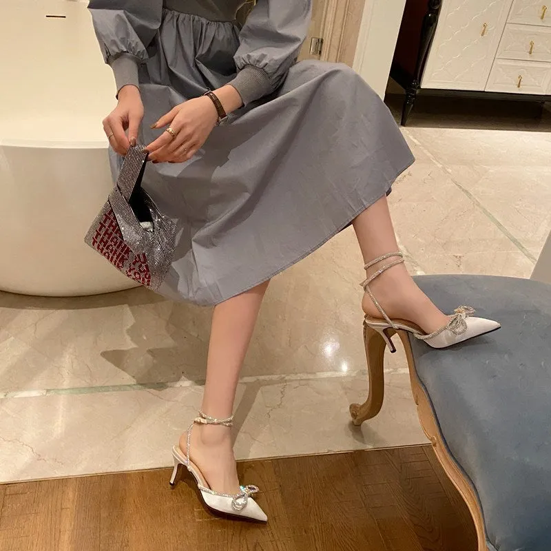 Butterfly-Knot Pointed Toe Pumps